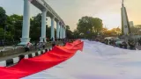 Ribuan Warga Bogor Bentangkan Bendera Merah Putih 500 Meter dalam FMP 2026