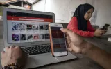 Sengketa Denda Rp 755 Miliar KPPU Soroti Legalitas Aturan OJK tentang Batas Maksimum Bunga Pinjol