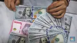 Rupiah Dibuka Melemah ke Rp18.000 per Dolar AS pada Perdagangan Selasa