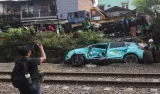 Mengapa Mobil Listrik Bisa Mati Mendadak di Rel Kereta Api Ini Penjelasan Pakar
