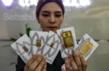 Harga Emas Antam Hari Ini Turun Rp20 Ribu Menjadi Rp2.603.000 per Gram